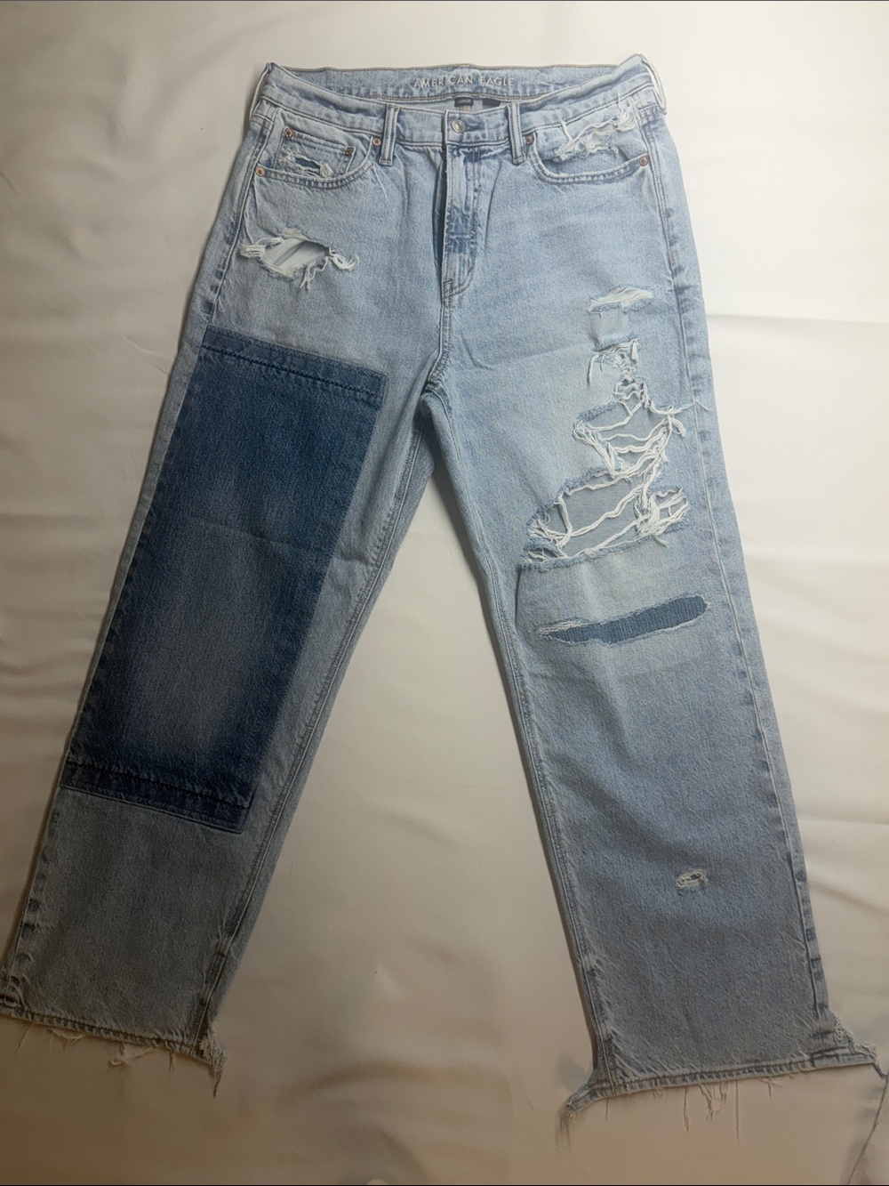 American Eagle Outfitters Light Blue Distressed Relaxed Jeans with Dark Patch